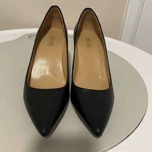 Black, leather, pointed pumps, size 7 1/2 M.